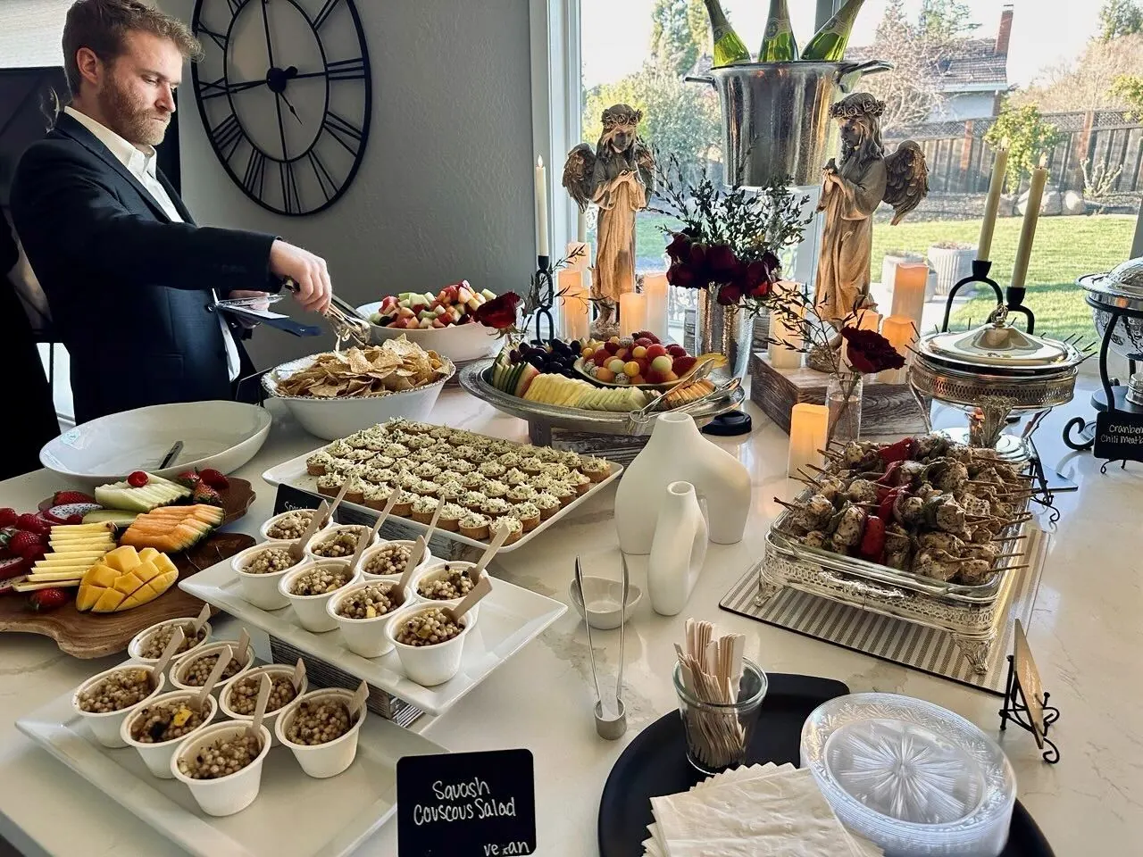 Attended buffet line with polished chafing dishes and fresh breads set for a Napa Valley winery dinner by Napa Catering Company